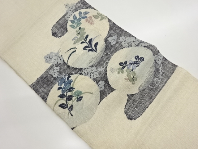 手織り真綿紬ヱ霞に丸文・草花模様織出し名古屋帯